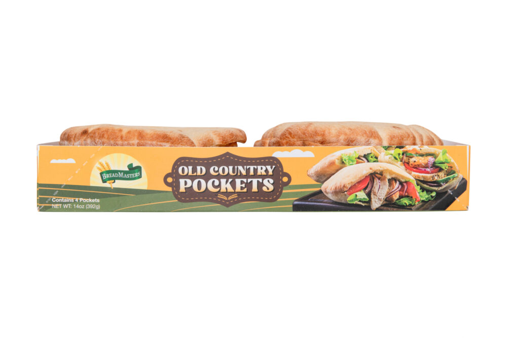 Old-Country-Pockets-4-Pack-Side-View-Breadmasters - Breadmasters Old Country Pockets 4-pack by Breadmasters - Side view of four individual packets of traditional thicker, denser pita bread stacked together, showing the packaging with NET WT 14oz (398g) label | Authentic pocket bread for falafel, gyros, and Mediterranean meals made with time-honored methods