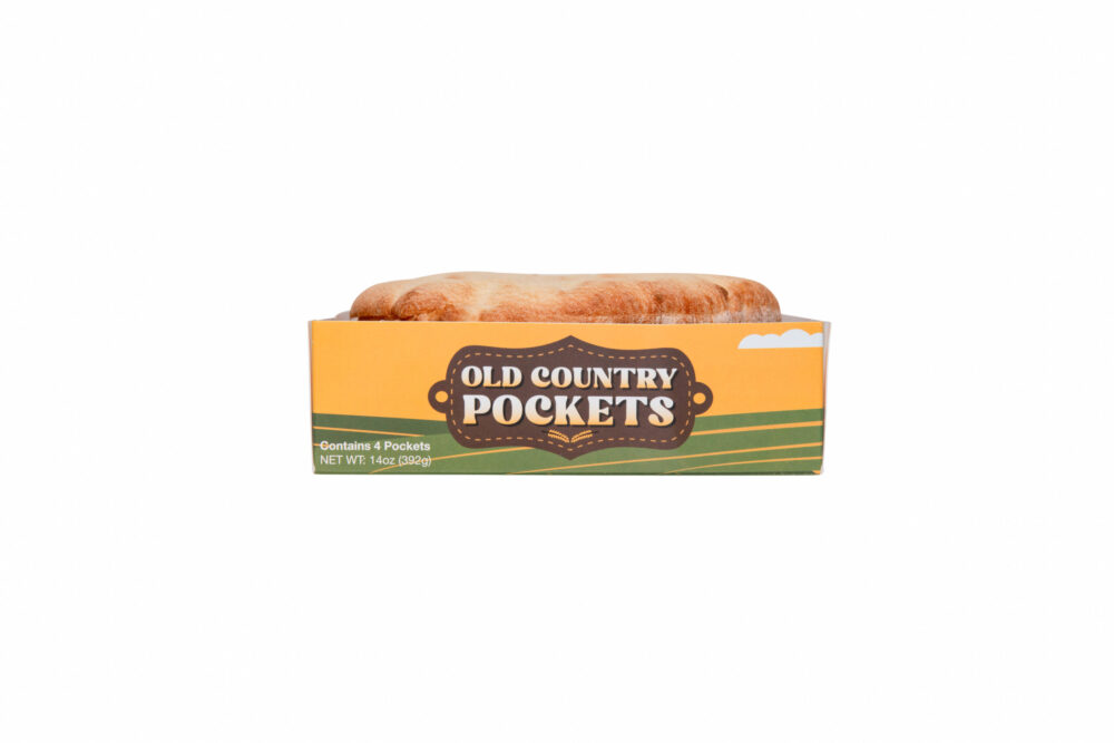 Old-Country-Pockets-4-Pack-Front-View-Breadmasters - Breadmasters Old Country Pockets 4-pack by Breadmasters - Front view of four individual packets of traditional thicker, denser pita bread, featuring the product label showing "Contains 4 Pockets" and NET WT 14oz (400g) | Authentic pocket bread perfect for falafel, gyros, and Mediterranean meals, made with time-honored methods